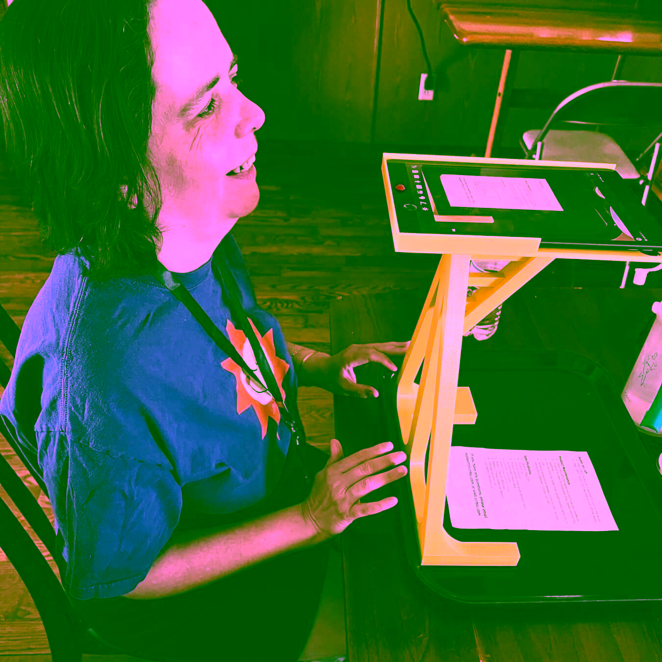 woman with visual impairment using 3d printed iPad stand for scanning documents scaled e1690914652948