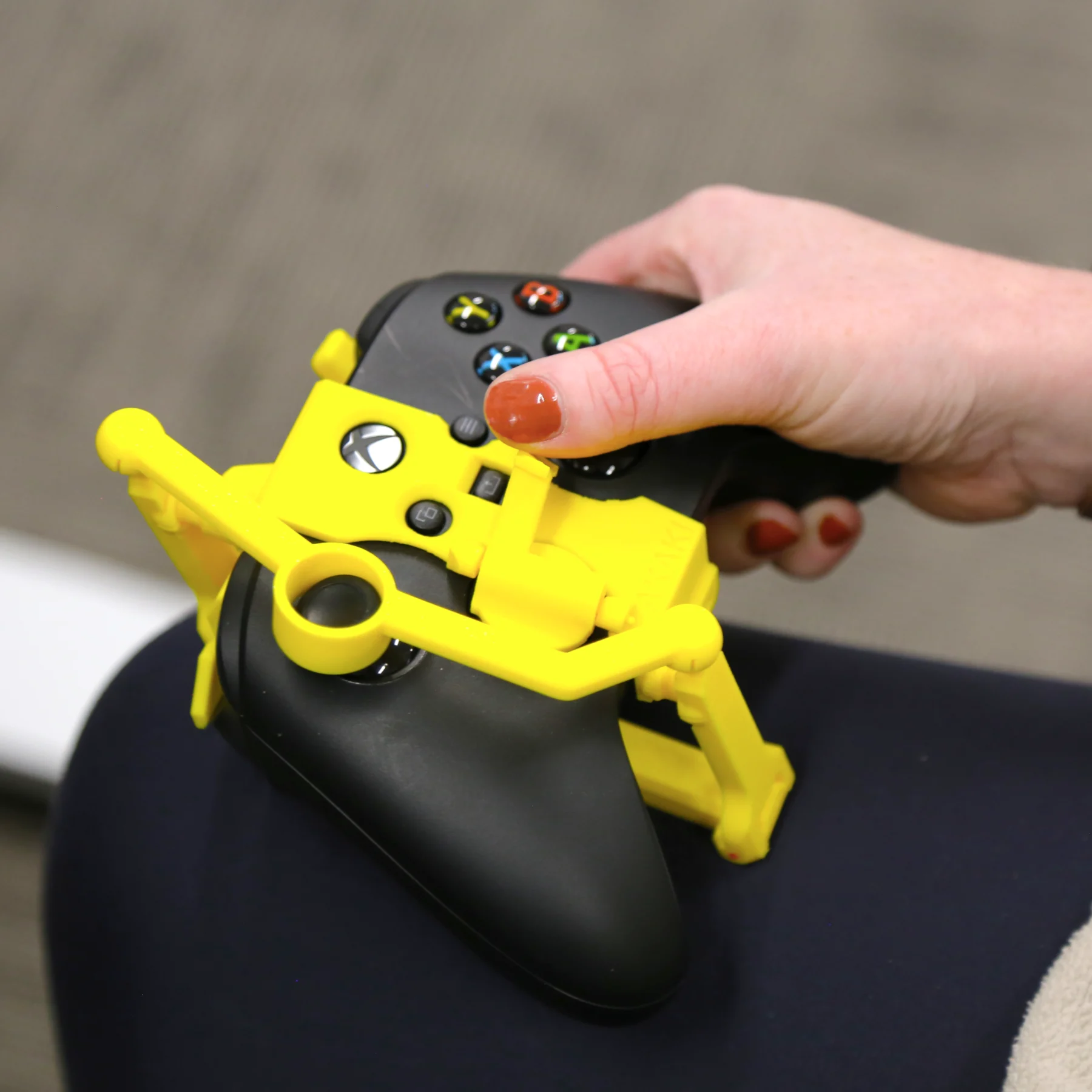 Person using Xbox one handed use controller