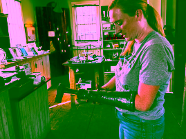 person using blacksmithing prosthesis