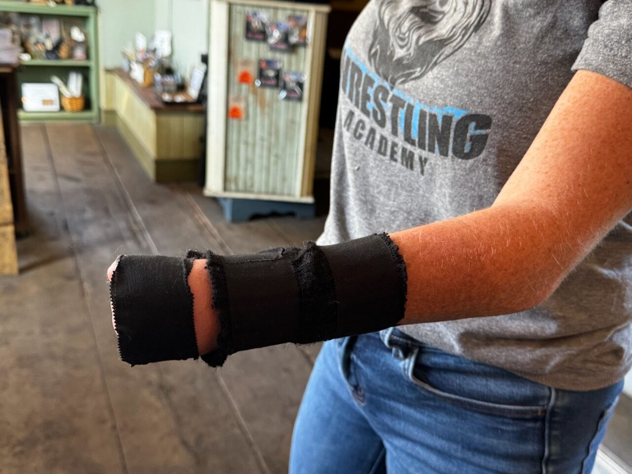 arm wrapped with protective sleeve