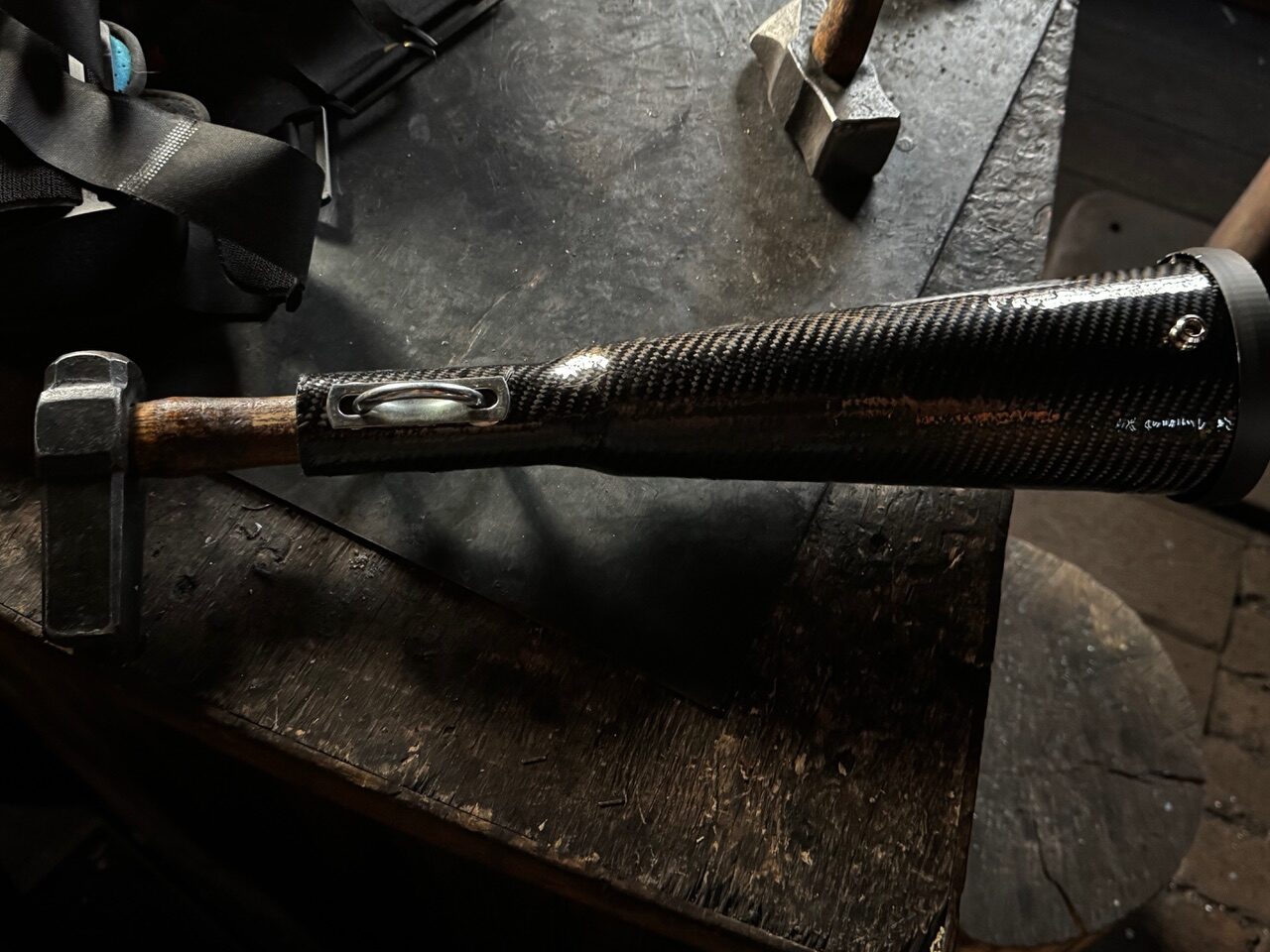 Adaptive Blacksmith Hammer on Workshop Table