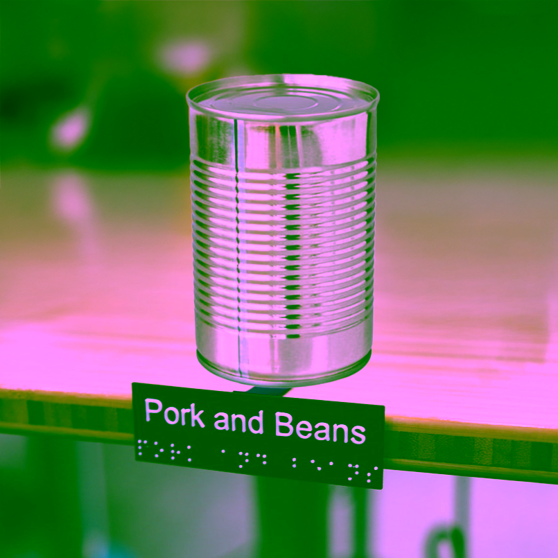 Tin can with braille shelf label, labeled pork and beans