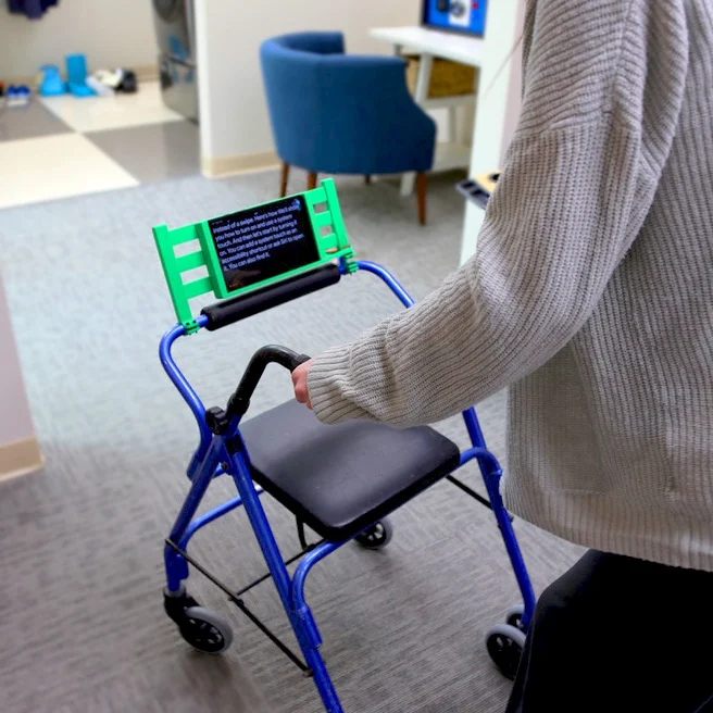 Rollator with caption companion mount attached