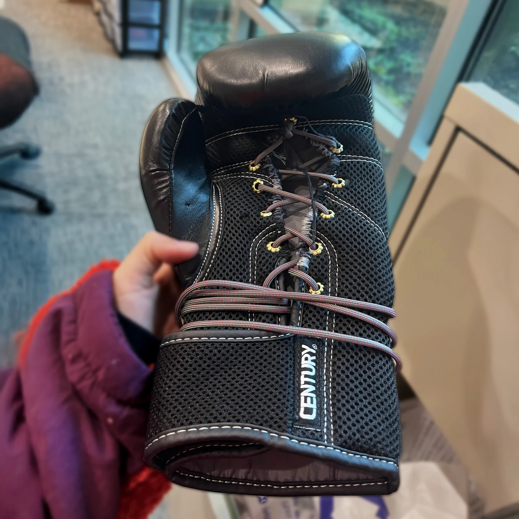 Connie's laced up boxing glove