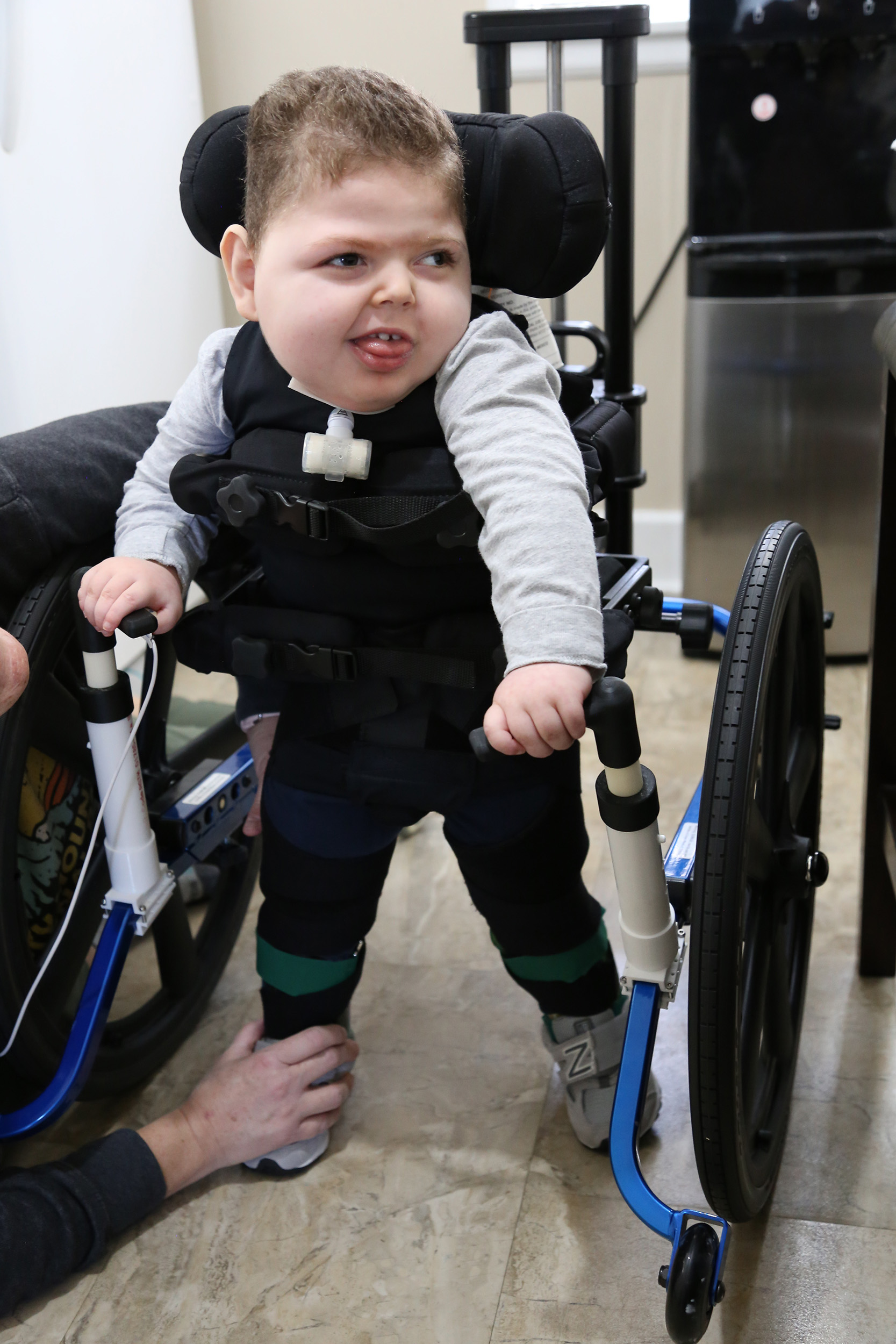 Noah using his adjustable handles standing up