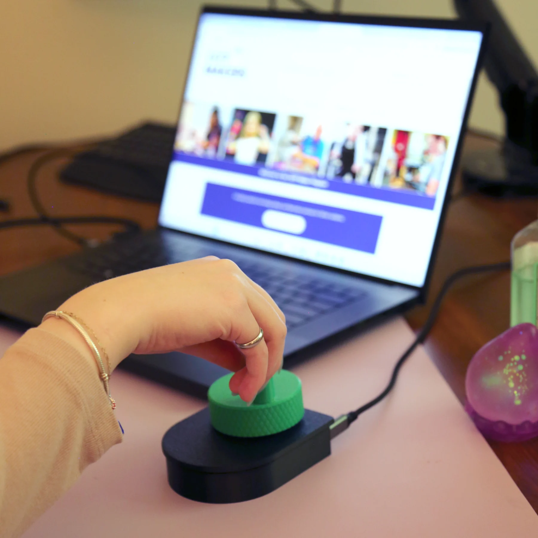 Enlarged Scroll Wheel being used with a laptop to scroll IATP Makers homepage