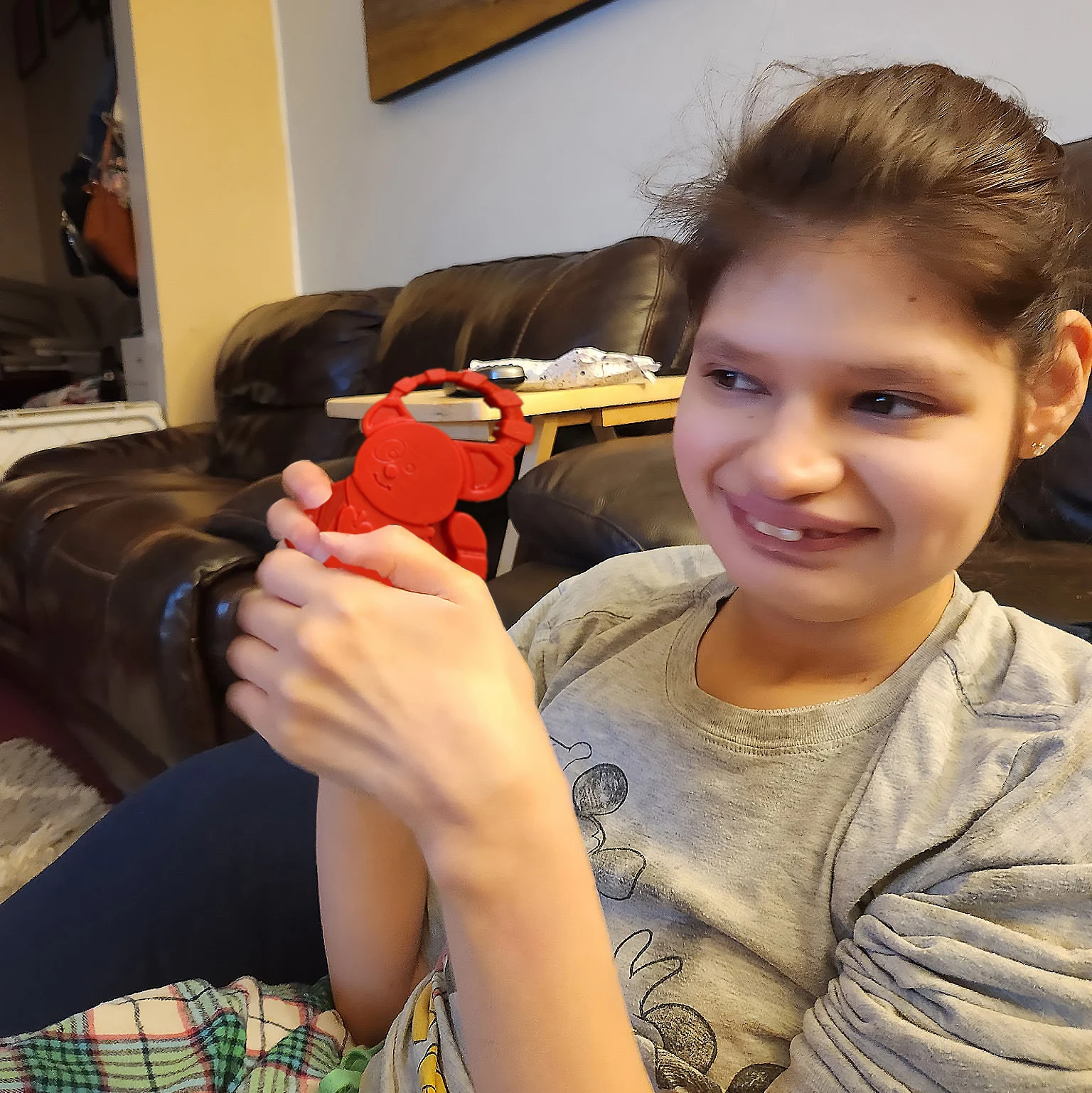 Hope holding on to rattle toy Hope holding on to rattle toy